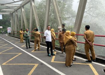 Cegah Bunuh Diri di Jembatan Cangar, Satreskrim Polres Batu bersama DPUPR Provinsi Jatim, Bangun Pagar Pelindung dan CCTV