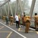Cegah Bunuh Diri di Jembatan Cangar, Satreskrim Polres Batu bersama DPUPR Provinsi Jatim, Bangun Pagar Pelindung dan CCTV